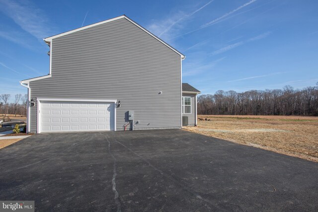 2107 Warrenton Rd, Fredericksburg, VA 22406 - view of home's exterior featuring driveway and a garage