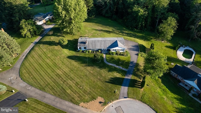 birds eye view of property with a rural view