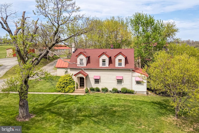 view of front of property with a front lawn