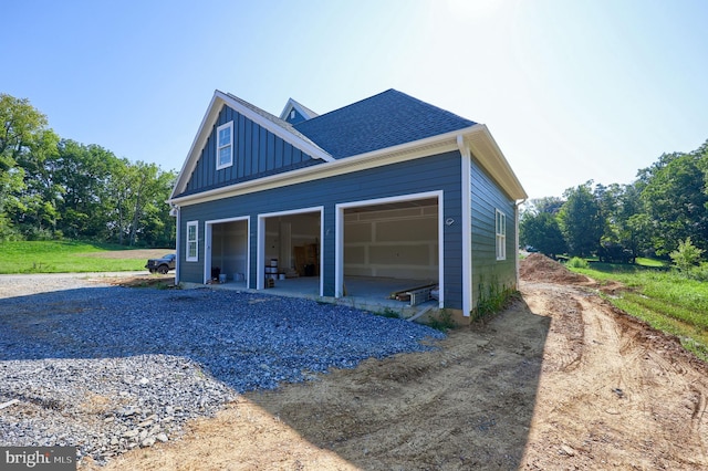 view of property exterior with a garage