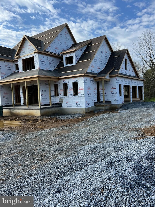 unfinished property featuring driveway