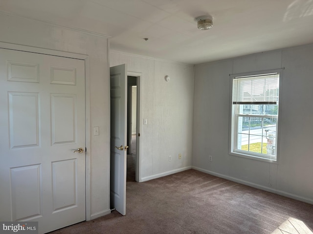 unfurnished bedroom with carpet