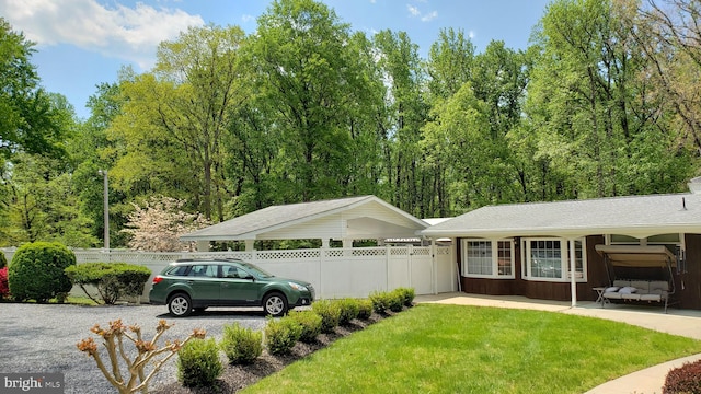 ranch-style house with a front lawn