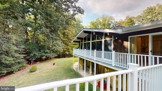 view of yard with a sunroom