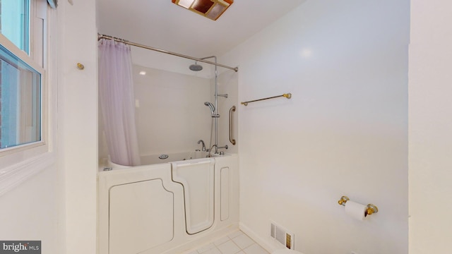 bathroom featuring curtained shower