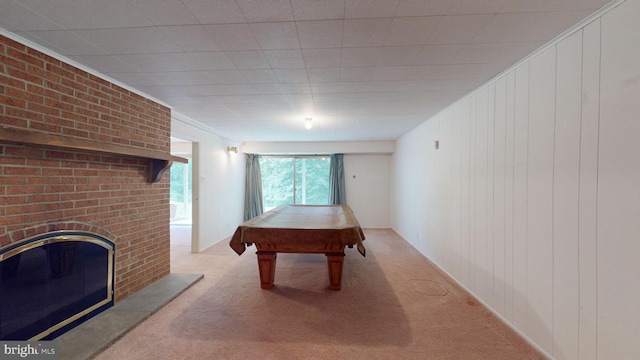 playroom featuring carpet flooring, pool table, and a fireplace