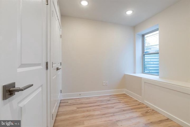 bedroom with light hardwood / wood-style floors