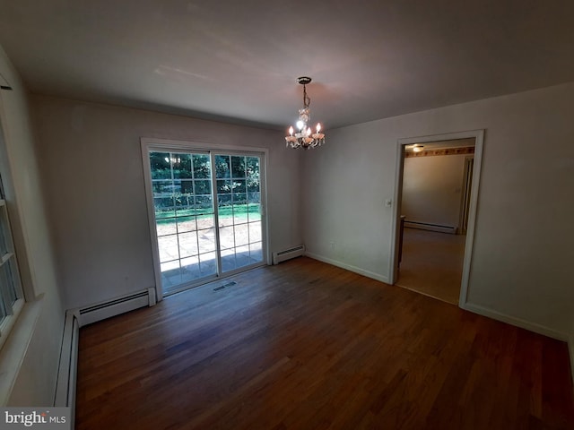 unfurnished dining area with dark wood-type flooring, baseboard heating, and a chandelier