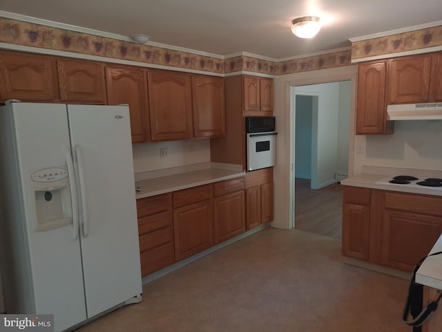 kitchen with white appliances and ornamental molding