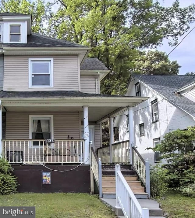 view of front of house with covered porch