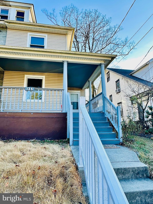 view of home's exterior featuring a porch