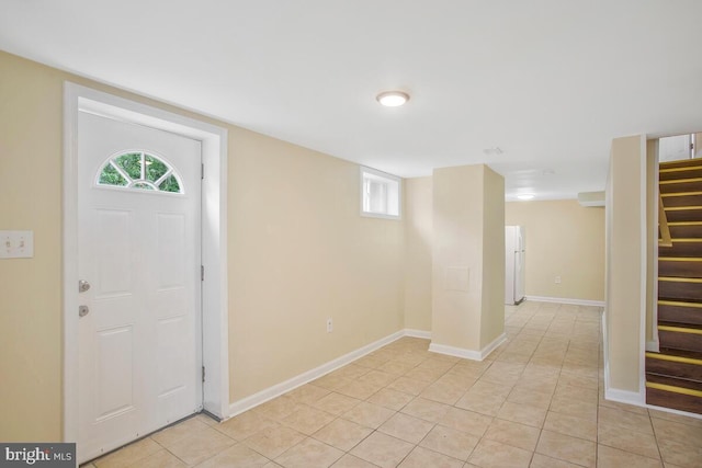 view of tiled foyer entrance