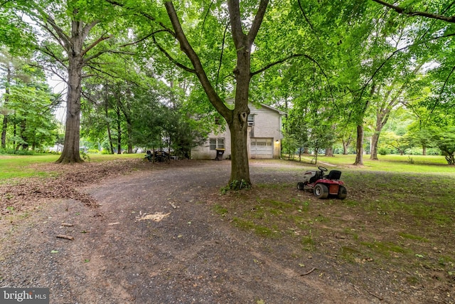 obstructed view of property featuring a garage