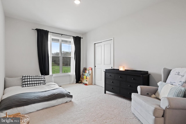 bedroom with light carpet