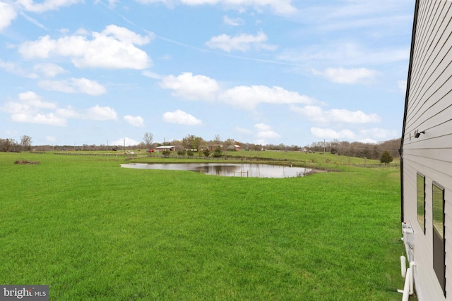 view of yard with a water view