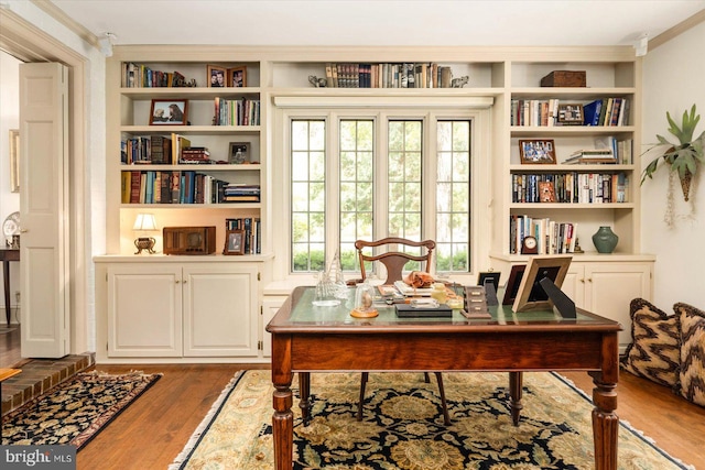 office area with hardwood / wood-style floors