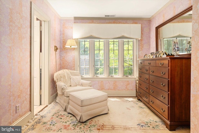 sitting room with crown molding