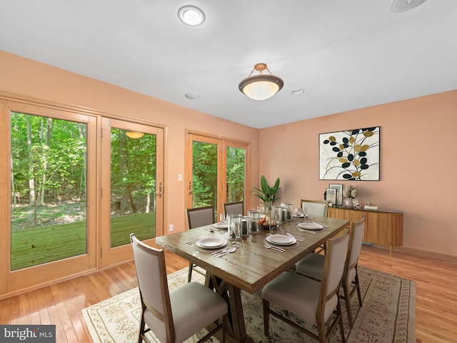 dining space featuring light hardwood / wood-style flooring