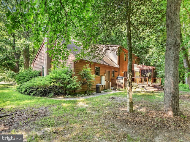 view of yard with a deck