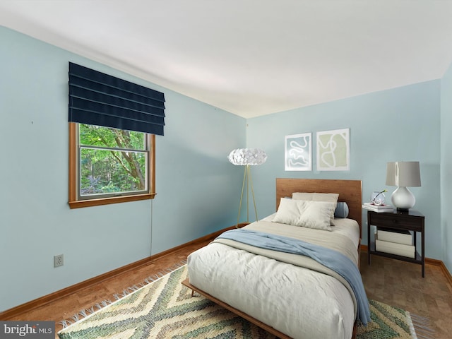 bedroom featuring hardwood / wood-style floors