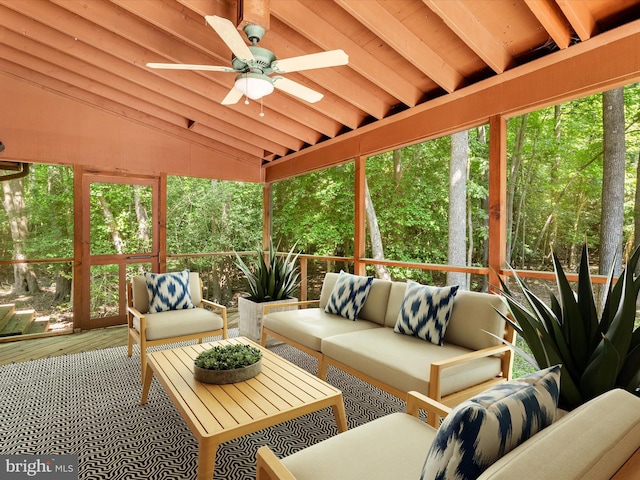 sunroom / solarium with vaulted ceiling with beams and ceiling fan