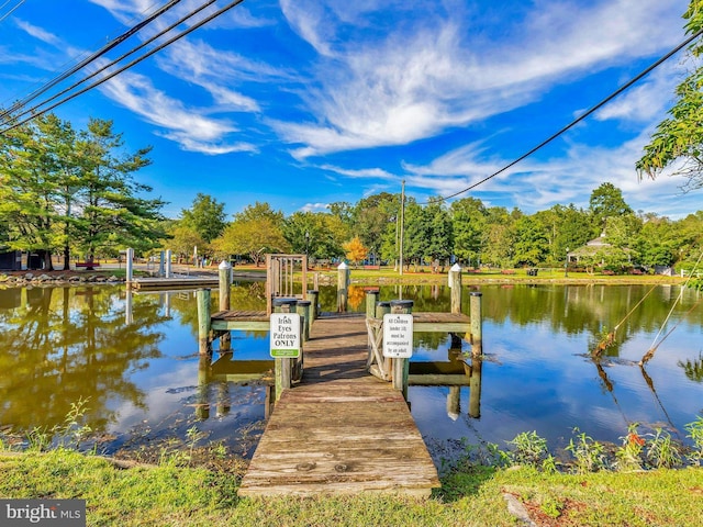 view of dock featuring a water view