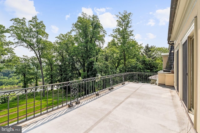 view of patio featuring a balcony