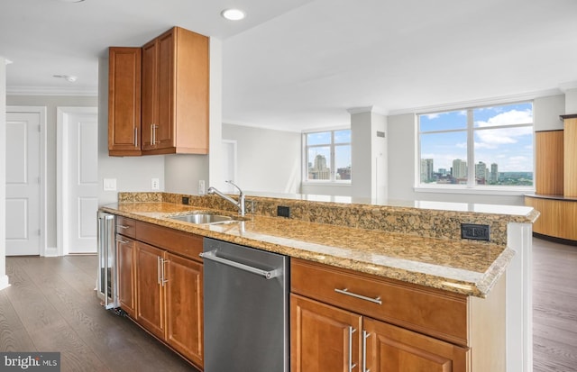 kitchen with dishwasher, light stone counters, dark wood-type flooring, crown molding, and a sink