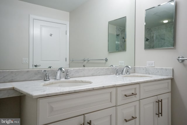 bathroom with double vanity and a sink