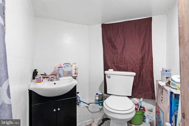 bathroom with vanity and toilet