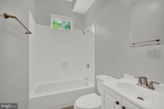 full bathroom featuring vanity, toilet, and tiled shower / bath combo