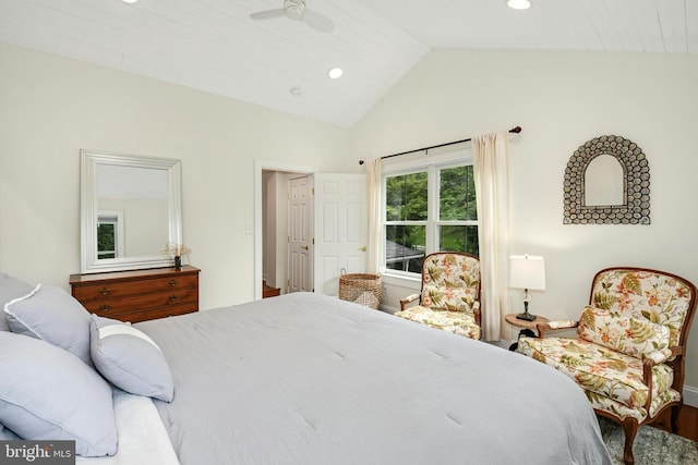 bedroom with ceiling fan, wood-type flooring, and vaulted ceiling