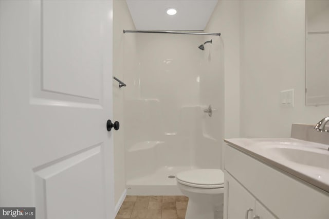 84 Limerick Ln, Selinsgrove, PA 17870 - bathroom featuring a shower, toilet, vanity, and baseboards