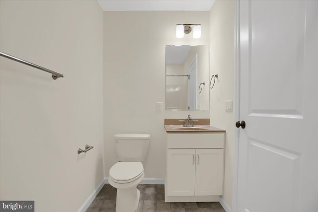 84 Limerick Ln, Selinsgrove, PA 17870 - bathroom featuring toilet, baseboards, and vanity