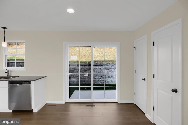 84 Limerick Ln, Selinsgrove, PA 17870 - unfurnished dining area with baseboards, dark wood finished floors, recessed lighting, and a sink