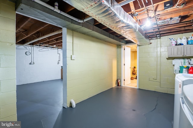 basement featuring washing machine and dryer