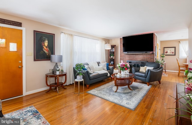 living room with light hardwood / wood-style floors