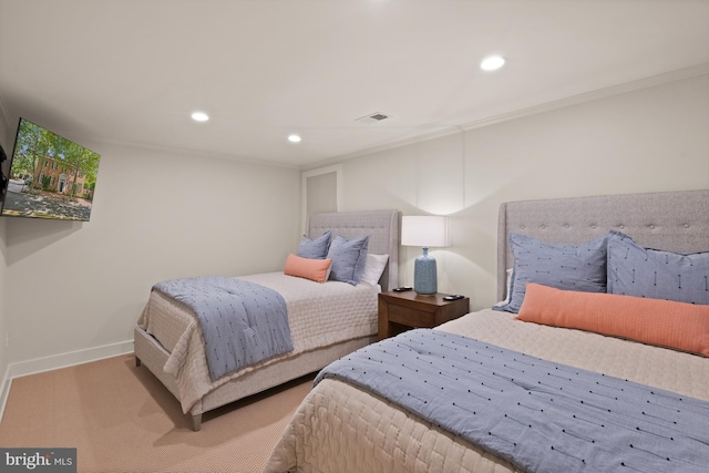 bedroom featuring light colored carpet and ornamental molding