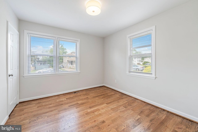 empty room featuring light hardwood / wood-style floors