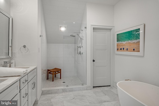 bathroom with vanity and independent shower and bath