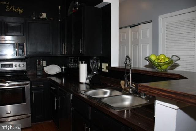 kitchen featuring sink and appliances with stainless steel finishes