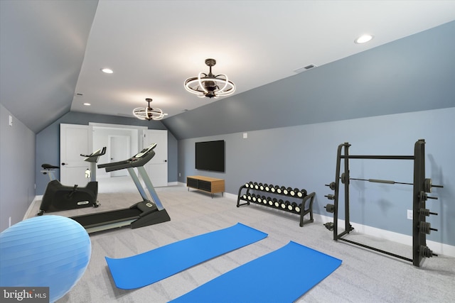 workout area with light colored carpet and lofted ceiling