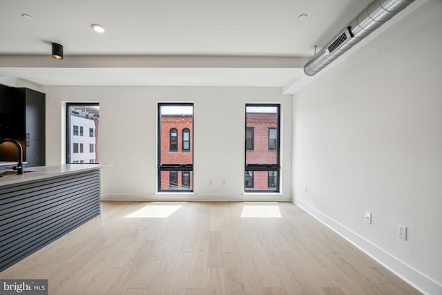 interior space with light hardwood / wood-style flooring