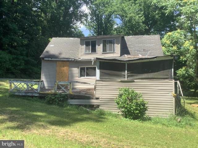 exterior space featuring a front lawn