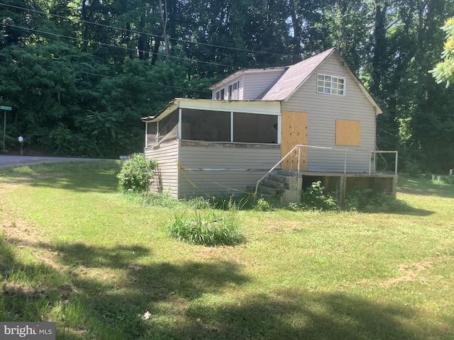 exterior space featuring a front yard