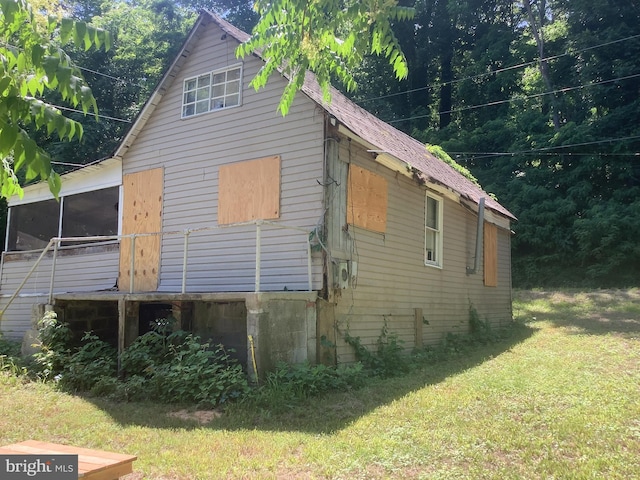 view of property exterior featuring a yard