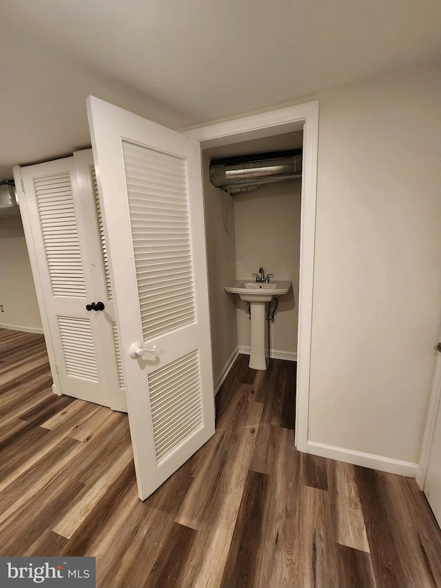 hall featuring dark hardwood / wood-style floors