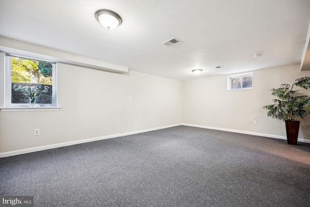 unfurnished room featuring carpet flooring