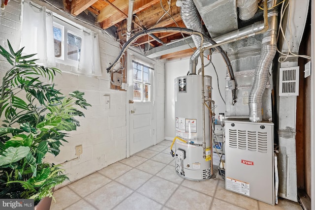 utility room with water heater