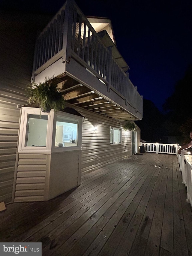 view of deck at night